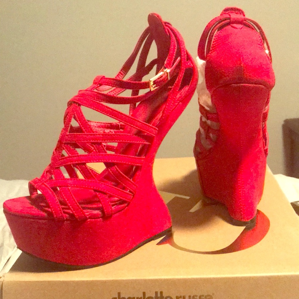 Red curved wedge heel sandals